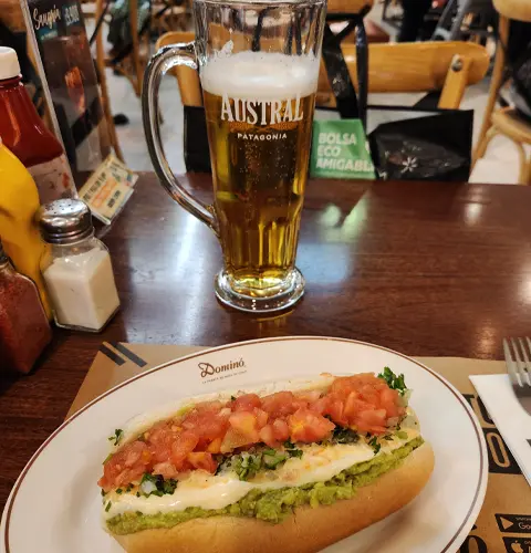 Traditional Chilean completo and local beer experience in Santiago